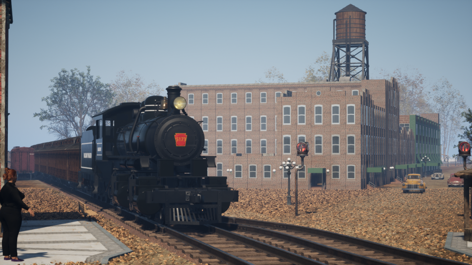 A train rolls through Red Bank in the first half of the 20th century in this rendering of historic Red Bank by Douglas Booton and Anthony Setaro, created using Unreal Engine. It is seen here passing the Eisner Building, a factory that made uniforms, and which later became home to the present Galleria, a collection of shops, restaurants and offices.