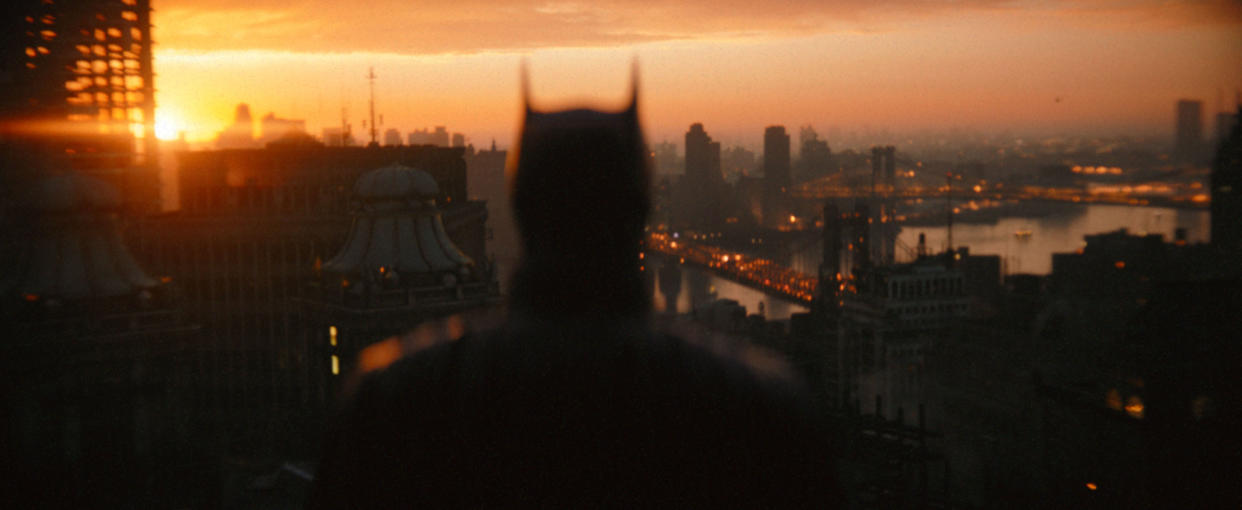 Robert Pattinson surveys Gotham City in a new image from The Batman (Photo: Courtesy of Warner Bros. Pictures/ ™ & © DC Comics)