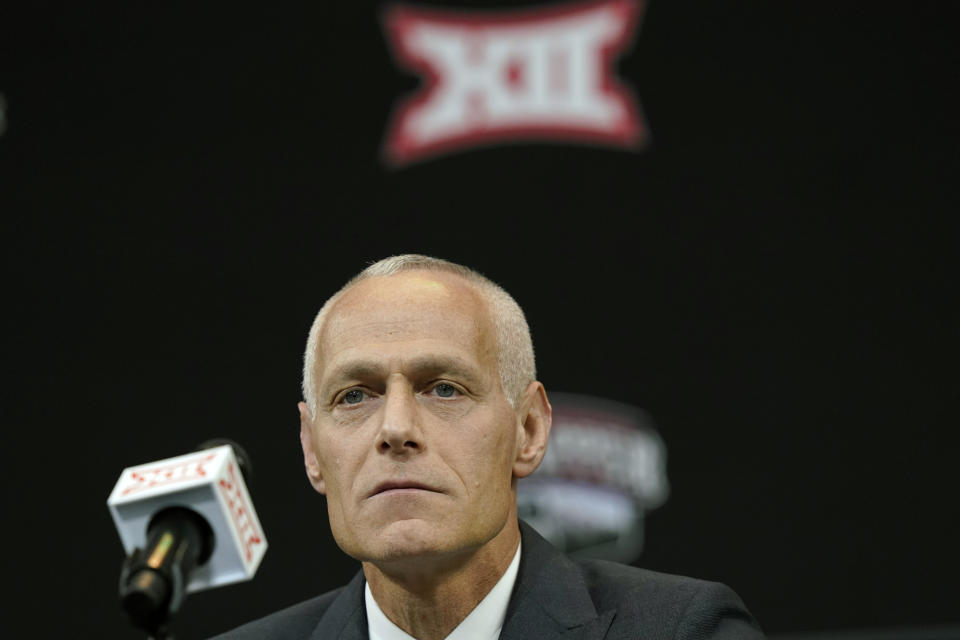 FILE - Incoming Big 12 Commissioner Brett Yormark listens during a news conference opening the NCAA college football Big 12 media days in Arlington, Texas, July 13, 2022. The Big 12 is going into its 12th and final season as a 10-team conference. (AP Photo/LM Otero, File)