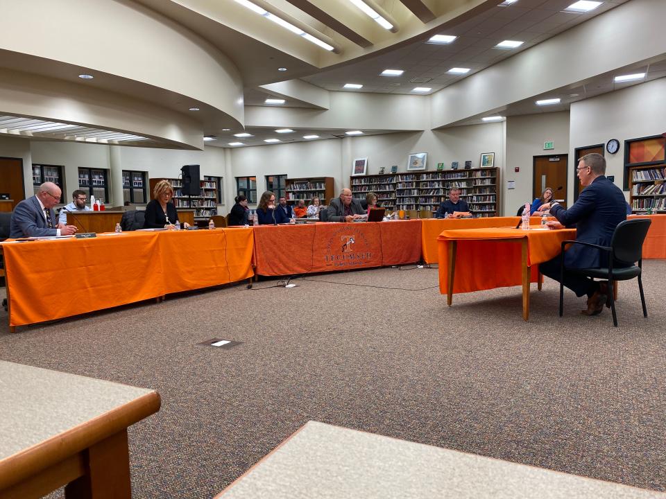 Tecumseh school board members listen Tuesday as Matt Hilton, right, answers a question during his second interview to be the Tecumseh schools superintendent.