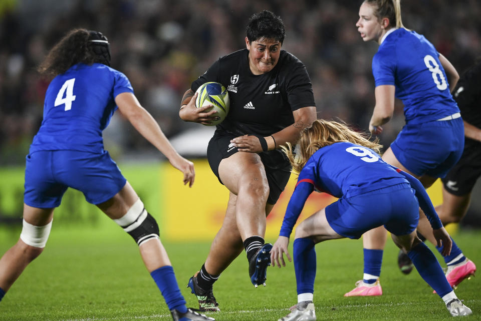 Krystal Murray of New Zealand runs at the defense during the women's rugby World Cup semifinal between New Zealand and France at Eden Park in Auckland, New Zealand, Saturday, Nov.5, 2022. (Andrew Cornaga/Photosport via AP)