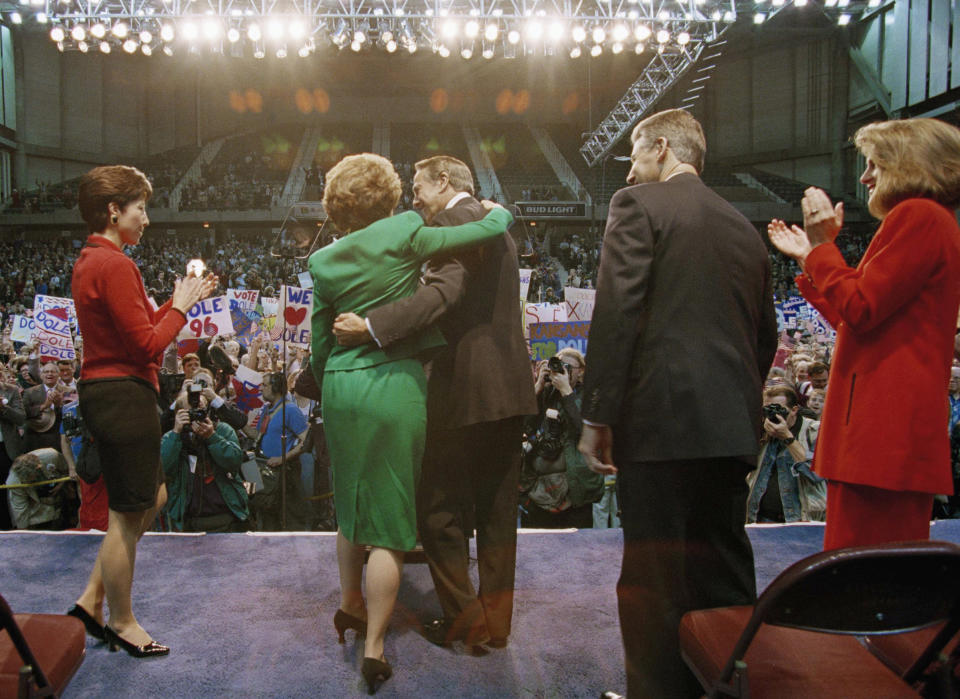 Sen. Bob Dole hugs his wife, Elizabeth, after announcing he is running for president on the Republican ticket on April 10, 1995, in Topeka, Kan.<span class="copyright">Doug Mills—AP</span>