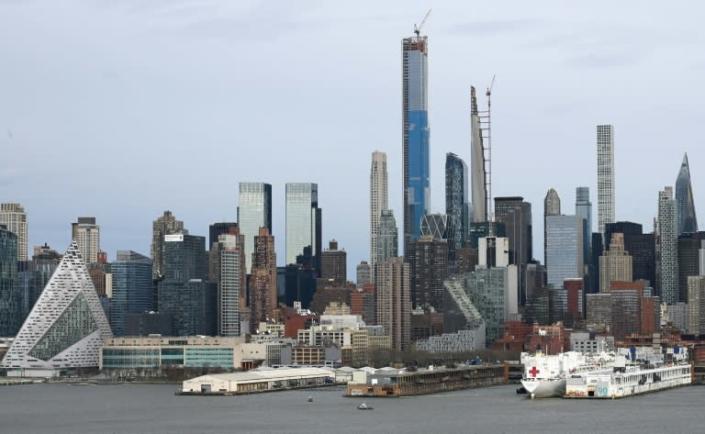 The USNS Comfort navy hospital ship sits at Pier 90 on April 2, 2020 as seen from Weehawken, New Jersey (AFP Photo/Angela Weiss)