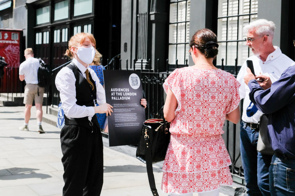 LONDON, UNITED KINGDOM - JULY 23, 2020 -  People queuing for the pilot performance by Beverley Knight at the London Palladium  testing social distancing measures- PHOTOGRAPH BY Matthew Chattle / Barcroft Studios / Future Publishing (Photo credit should read Matthew Chattle/Barcroft Media via Getty Images)