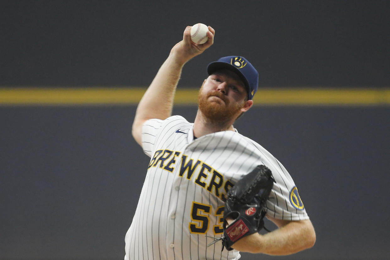 MILWAUKEE, WISCONSIN - AUGUST 07: Brandon Woodruff #53 of the Milwaukee Brewers pitches in the first inning against the San Francisco Giants at American Family Field on August 07, 2021 in Milwaukee, Wisconsin. (Photo by Quinn Harris/Getty Images)