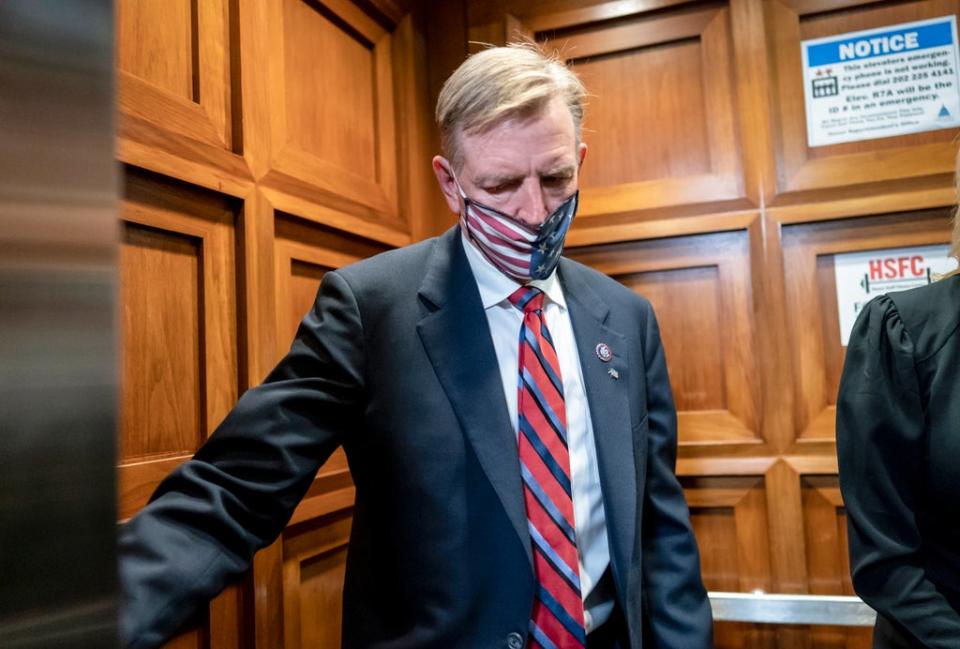 Rep. Paul Gosar, R-Ariz., takes an elevator as the House of Representatives prepares to vote on a resolution to formally rebuke him for tweeting an animated video that depicted him striking Rep. Alexandria Ocasio-Cortez, D-N.Y., with a sword, on Capitol Hill in Washington, Wednesday, Nov. 17, 2021. In addition to the official censure, House Democrats want to oust him from his seats on the House Oversight Committee and the Natural Resources Committee. (AP Photo/J. Scott Applewhite) (AP)