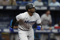 Miami Marlins' Jorge Soler watches his solo home run off Tampa Bay Rays starting pitcher Drew Rasmussen during the fourth inning of a baseball game Wednesday, May 25, 2022, in St. Petersburg, Fla. (AP Photo/Chris O'Meara)