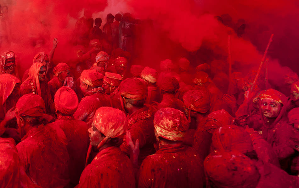 It's a sea of color in Barsana.<br><br> <p>Travel photojournalist JITENDRA SINGH lives and works in Shimla, Himachal Pradesh and is deeply interested is music, the visual arts and literature. His work has been used by Getty Images, National Geographic Traveler, Outlook Traveller, and government departments such as the Ministry of External Affairs, Ministry of Culture. <a href="http://www.flickr.com/photos/jitens/" rel="nofollow noopener" target="_blank" data-ylk="slk:Enjoy more of his work on Flickr;elm:context_link;itc:0;sec:content-canvas" class="link ">Enjoy more of his work on Flickr</a></p>