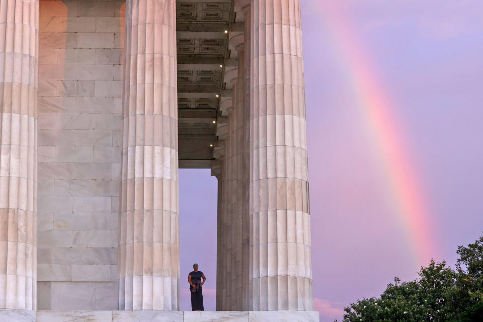 Image: A rainbow appears behind the Lincoln Memorial as Fitzpatrick prepares to begin her day, coincidentally Juneteenth, with a sunrise walk in Washington (Jonathan Ernst / Reuters)