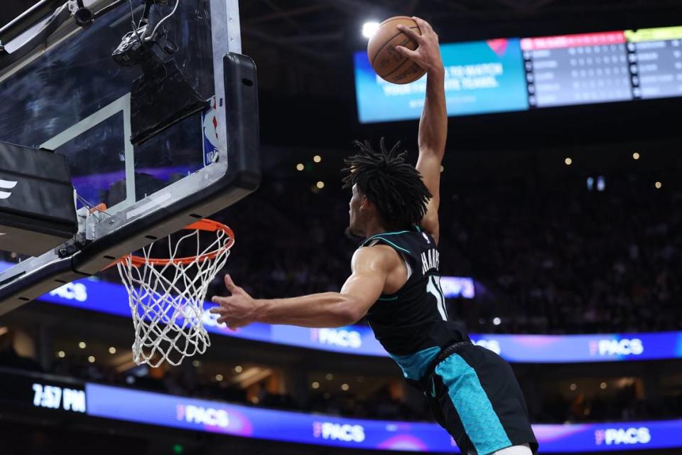 Former Kentucky basketball recruit Shaedon Sharpe flies in for a dunk in a game against the Utah Jazz earlier this month.