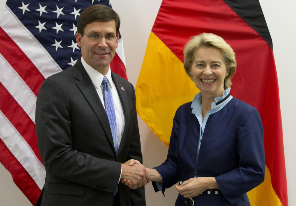 Acting U.S. Secretary for Defense Mark Esper, left, greets German Defense Minister Ursula von der Leyen on the sidelines of a meeting of NATO defense ministers at NATO headquarters in Brussels, Wednesday, June 26, 2019. (AP Photo/Virginia Mayo, Pool)