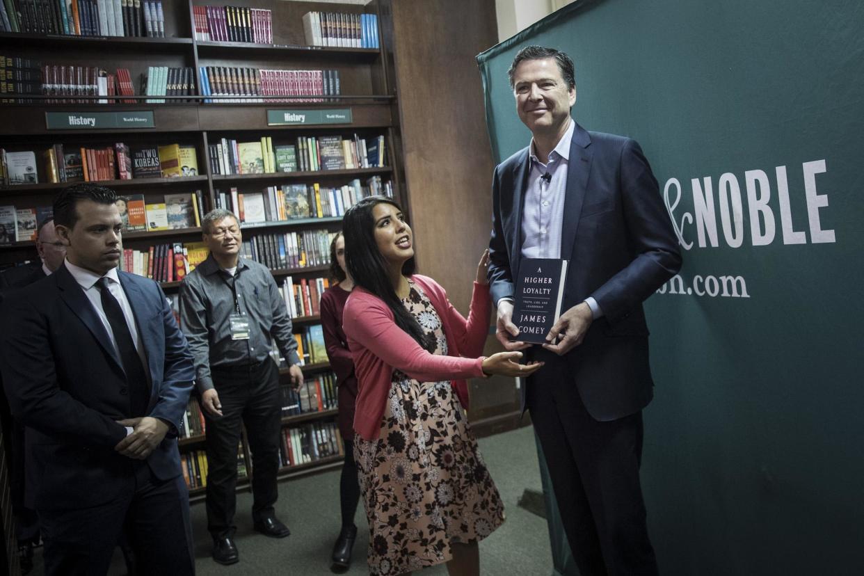 Former FBI Director James Comey poses for photographs as he arrives to speak about his new book "A Higher Loyalty: Truth, Lies, and Leadership" in New York: Getty Images