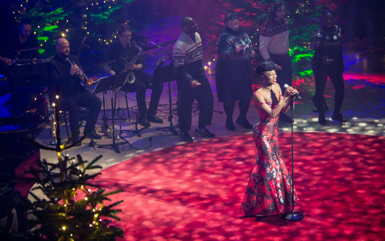 Singer Miriam-Teak Lee performing in Christmas Actually