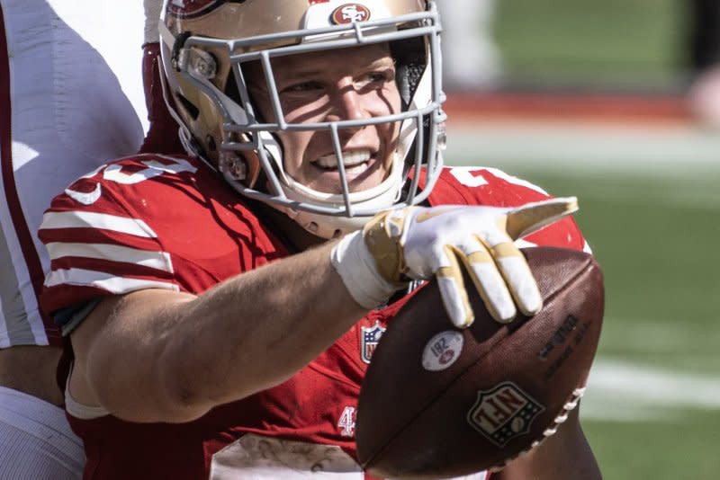 San Francisco 49ers running back Christian McCaffrey celebrates scoring a touchdown against the Arizona Cardinals on Sunday at Levi's Stadium in Santa Clara, Calif. Photo by Terry Schmitt/UPI