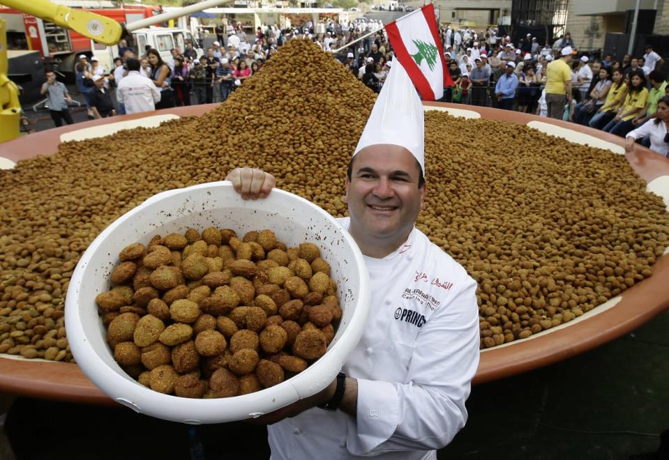 The term moreish may have been coined to describe falafel, which can never be consumed in small quantities. Anyone wishing to put themselves to the test could attempt to eat this portion served up by Lebanese chef Ramzi Choueiry, which weighed in at 11,400 lbs (173 kg). "Getty Images"