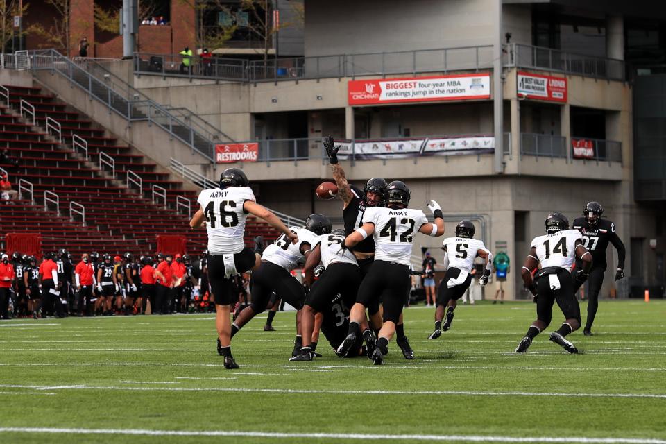 Army's Zach Harding (46) punts against Cincinnati during the 2020 season.