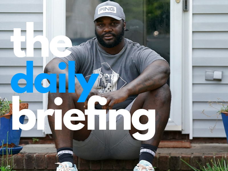 Cincinnati Bengals defensive tackle DJ Reader sits on the step for a portrait in front of the house he grew up in, Friday, June 16, 2023, in Greensboro, N.C. Reader was homeschooled by his dad, David Reader, from second until sixth grades.
