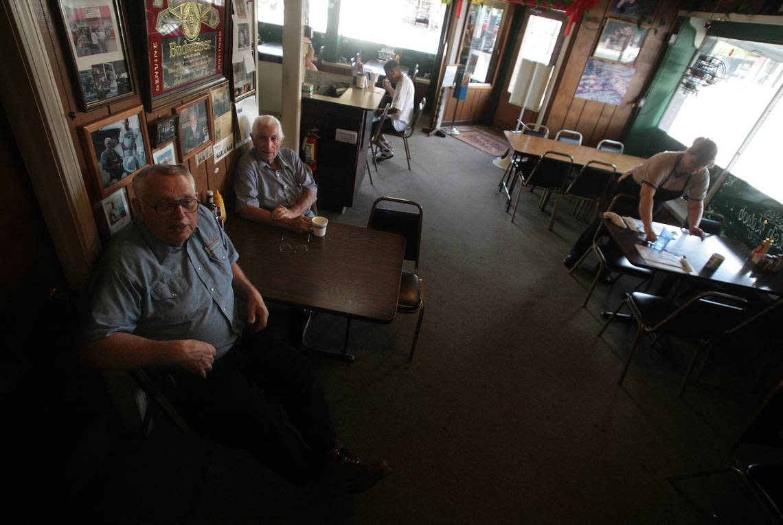 Harry Horasanian, far left, owner of Uncle Harry’s Restaurant in downtown Reedley, has a hobby of astrology, and routinely offers advice to customers. He keeps company here with longtime friend and customer Manuel Raphael, seated with him in this Fresno Bee file photo from 2008.