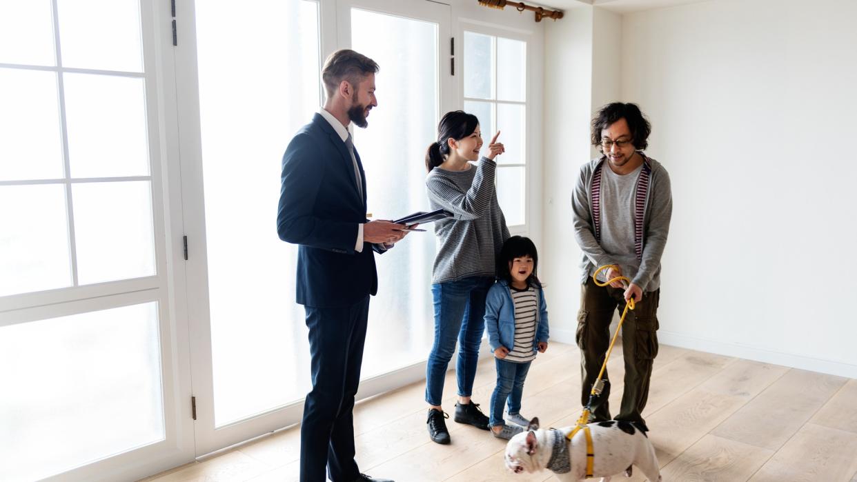 Asian family buy new house.