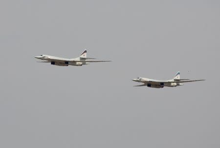 FILE PHOTO: Russian Tu-160 bombers fly during a joint Kazakh-Russian military exercise at Otar military range, some 150km (93 miles) west of Almaty, Kazakhstan, October 3, 2008. REUTERS/Shamil Zhumatov/File Photo