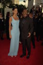 <p>Can you tell sheath dresses were a thing? The Murphys arrived at the Golden Globes wearing a baby blue sheath and an all-black suit. </p>