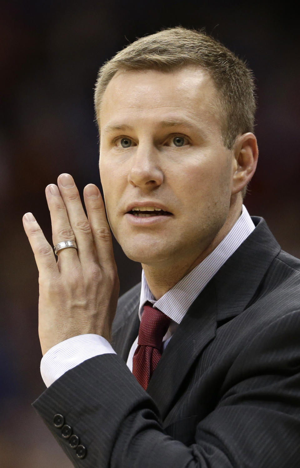 Iowa State coach Fred Hoiberg talks to his players during the first half of an NCAA college basketball game against Kansas in the Big 12 men's tournament Friday, March 14, 2014, in Kansas City, Mo. (AP Photo/Charlie Riedel)