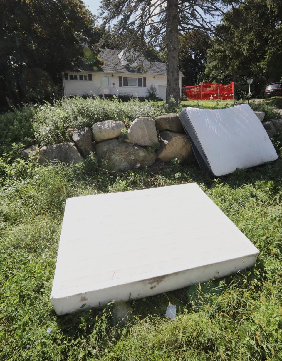 Mattresses in front of a house at 295 New Hempstead Road in New City that Clarkstown has cited for allegedly housing 31 migrants and violating numerous codes Sept. 19, 2023.
(Credit: Peter Carr/The Journal News)