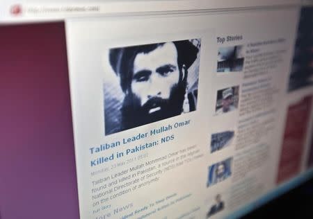 The Tolonews website runs a story on its front page reporting about news of the death of Taliban leader Mullah Mohammad Omar in Kabul May 23, 2011. REUTERS/Ahmad Masood/Files