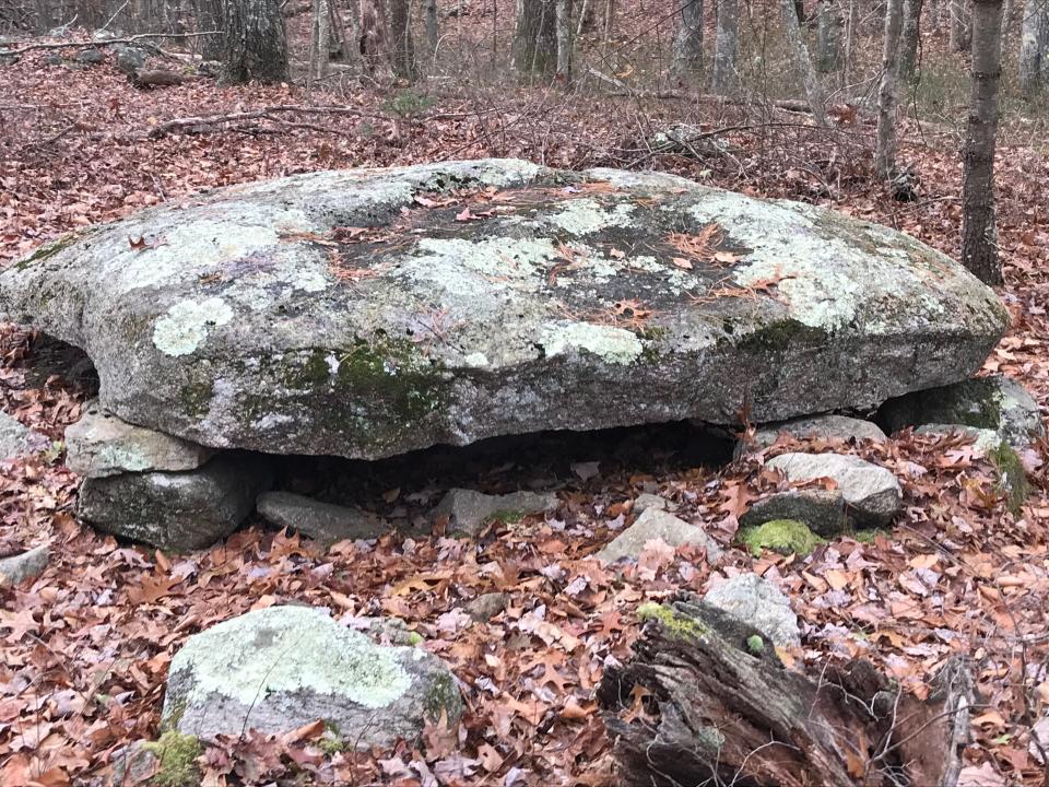 Located on a side spur off the Foster Loop, Table Rock, a huge, flat circular slab of granite, is propped up on smaller stones.