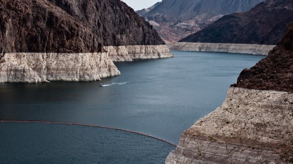 A ring of light-colored rock shows how much the water level has dropped at Nevada's Lake Mead.