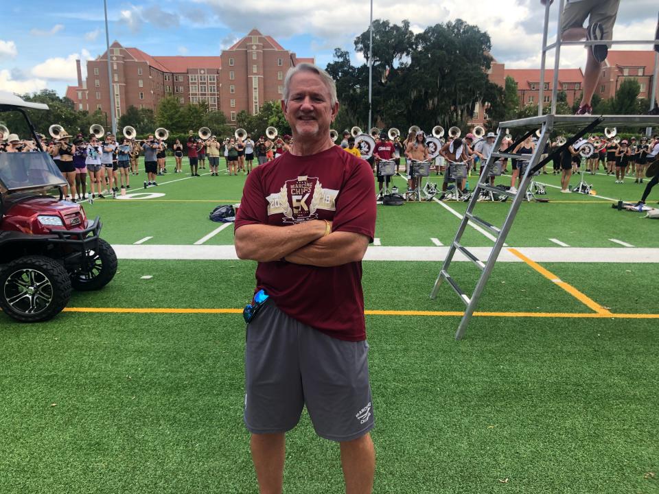 Dave Westberry is Florida State University's band announcer, also known as the 'voice' of the Marching Chiefs. He poses for a photo during the band's rehearsal on Monday, August 24, 2022.