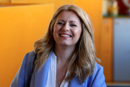Slovakia's presidential candidate Zuzana Caputova reacts as she casts her vote during the country's presidential election run-off, at a polling station in Pezinok, Slovakia, March 30, 2019. REUTERS/David W Cerny