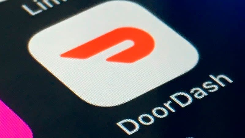 The DoorDash app is shown on a smartphone on Feb. 27, 2020, in New York. DoorDash partnered with nonprofits, including many religious groups, for Project DASH, which supplied meals to people in need in cities around the country.