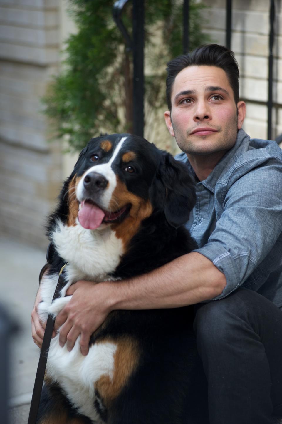 This undated image released by CBS shows dog guru Justin Silver, host of the new show "Dogs in the City," in New York. Every Wednesday beginning May 30, Silver will try to help New York City hounds and humans tackle unsettling problems like joint custody after divorce or dealing with significant others who just moved in. (AP Photo/CBS, Brian Friedman)