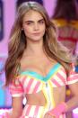 <p>Cara Delevingne makes her VS runway debut with subtle waves and minimal makeup in 2012.</p>