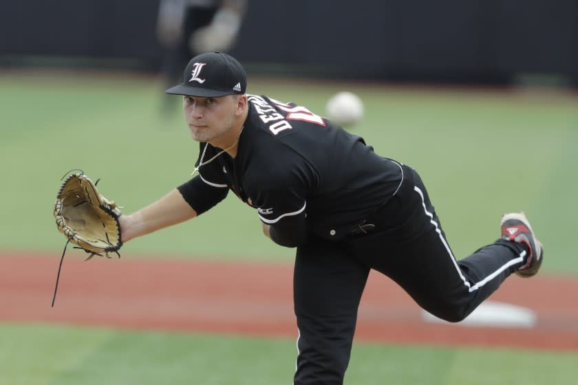 Louisville's Reid Detmers throws during Game 1 of an NCAA college baseball super regional tournament against East Carolina, Friday, June 7, 2019, in Louisville, Ky. (AP Photo/Darron Cummings)