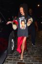 <p>In a t-shirt from her own merch, Marni fur stole, Are You Am I slip dress and silver heeled sandals while out in NYC.</p>