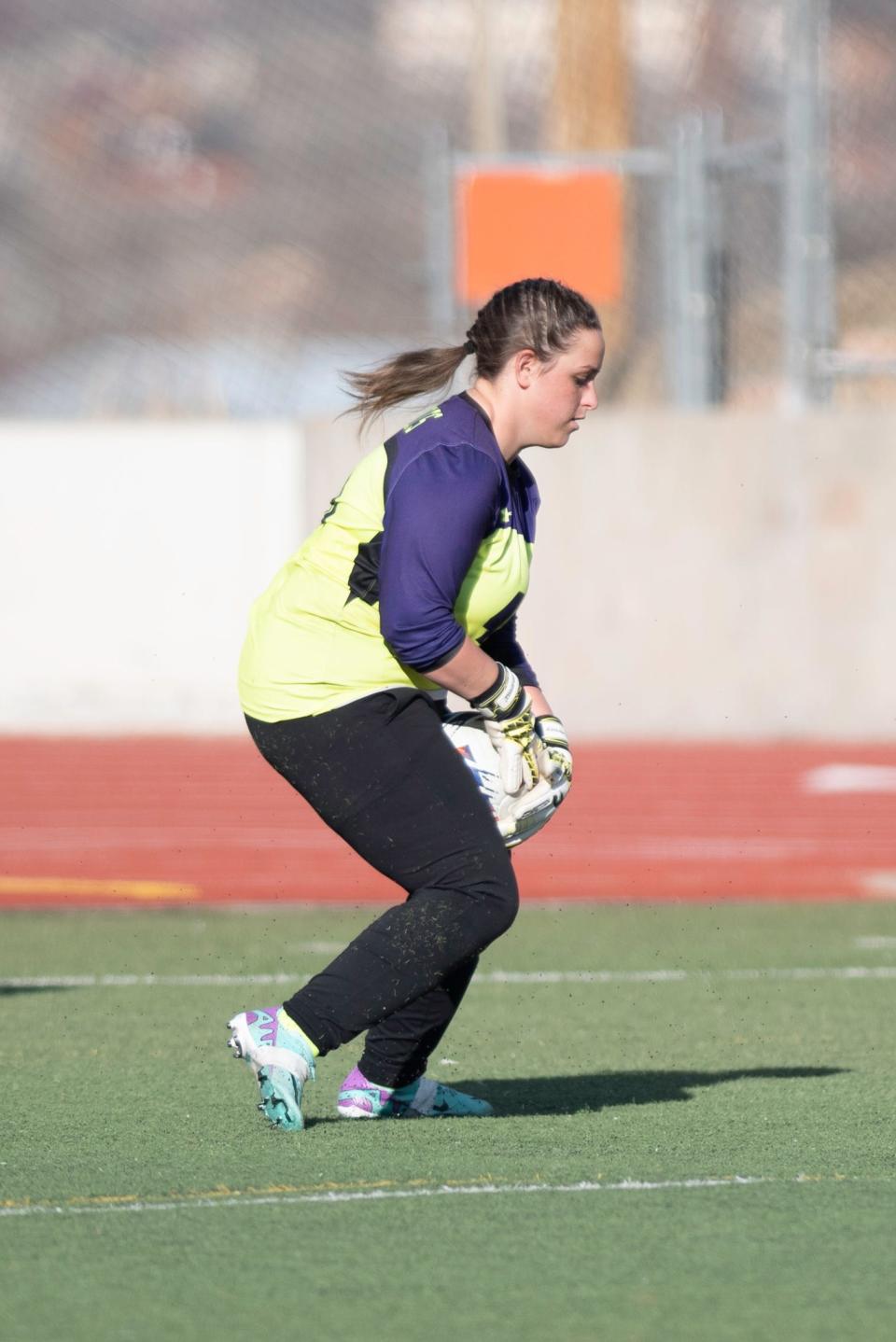 Rye High School's Stephanie Bak blocks a shot during a matchup with Pueblo East at Dutch Clark Stadium on Tuesday, March 19, 2024.