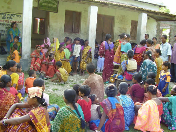 Women in a government loan program meet to discuss witch hunts in India's Jalpaiguri district.