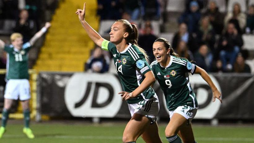 Lauren Wade celebrates her 50th international match