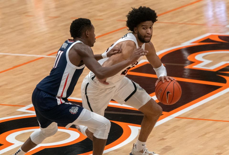 Pacific's Jahbril Price-Noel, right, drives on Gonzaga's Joel Ayayi during break in a WCC men's basketball game at Pacific's Spanos Center in Stockton.