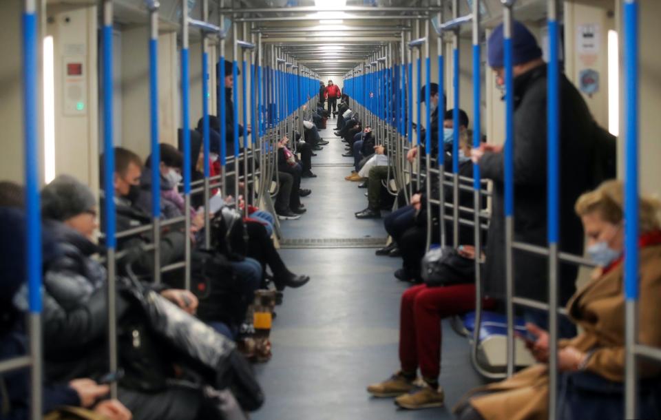 moscow russia subway train riders comuters mface masks coronavirus covid 19 lockdown 2020 04 02T165606Z_596459452_RC2GWF9F9IU9_RTRMADP_3_HEALTH CORONAVIRUS MOSCOW METRO.JPG