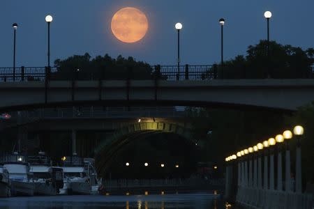 A Supermoon is seen over the Rideau Canal in Ottawa July 12, 2014. REUTERS/Blair Gable