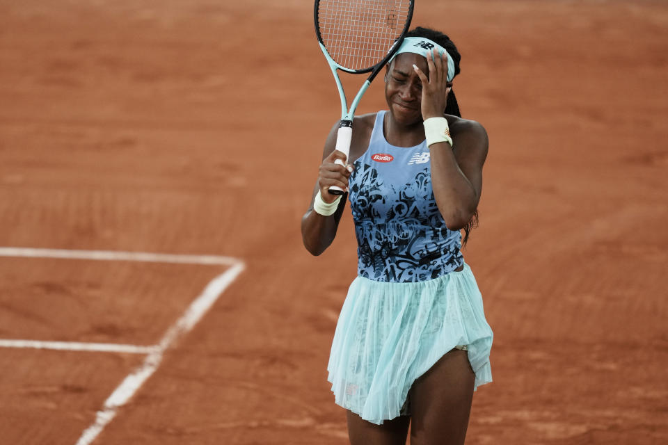 Coco Gauff of the U.S. reacts after missing a shot against Poland's Iga Swiatek during the final match at the French Open tennis tournament in Roland Garros stadium in Paris, France, Saturday, June 4, 2022. (AP Photo/Thibault Camus)