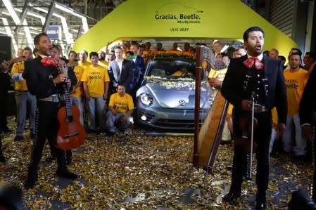 Mariachis a Mexican musicians play music during a ceremony marking the end of production of VW Beetle cars, at company's assembly plant in Puebla