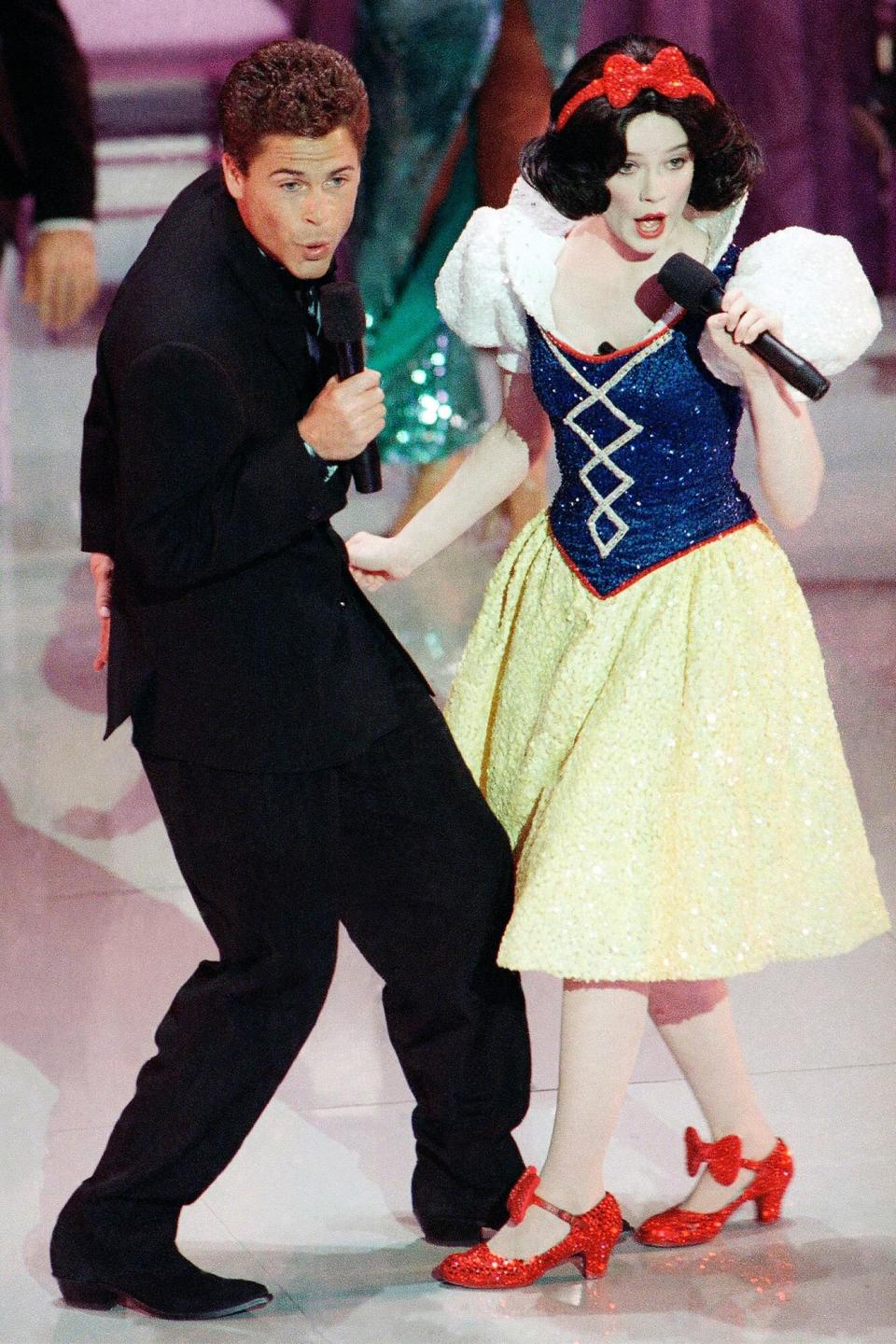 Mandatory Credit: Photo by Reed Saxon/AP/Shutterstock (6569406a) Rob Lowe Snow White Actor Rob Lowe croons a tune to Snow White during the opening number for the 61st Academy Awards presentation in Los Angeles. What are TV viewers seeking from their annual Oscar fix? The same thing they want from movies: drama, comedy, sex, slapstick, glamour and romance. This year's Oscarcast airs, at 8 p.m. EST on ABC Oscars-Impossible Dream, Los Angeles, USA