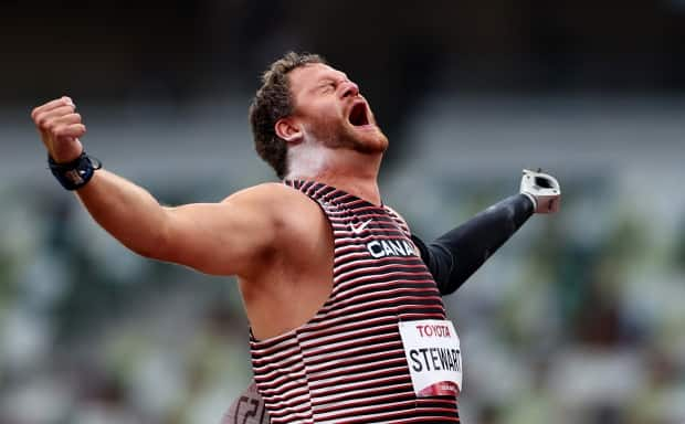 Canada's Greg Stewart winning gold in shot put at the Tokyo Paralympics on Wednesday. (Athit Perawongmetha/Reuters - image credit)