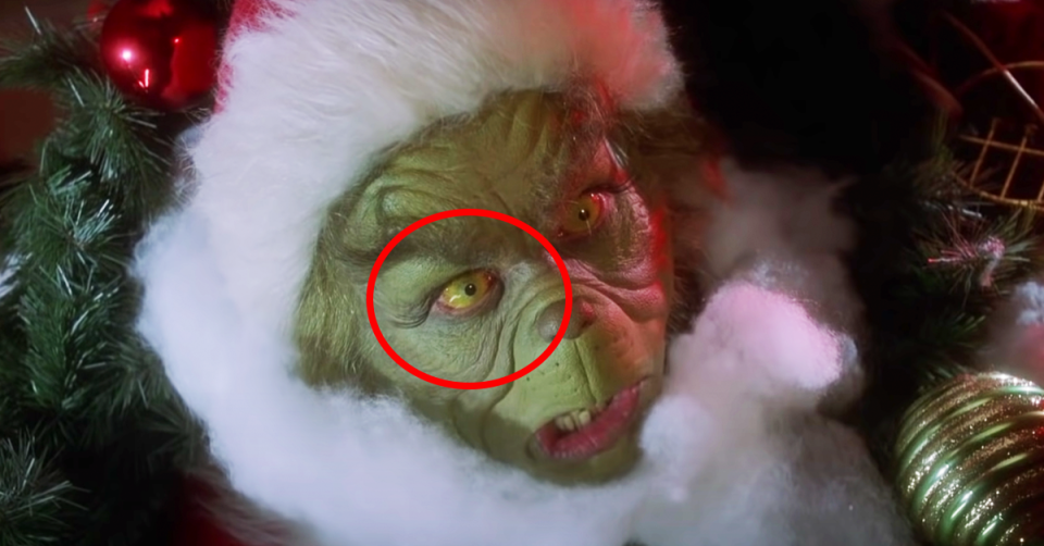 The Grinch is seen with green eyes throughout the movie. Source: YouTube/Universal Pictures