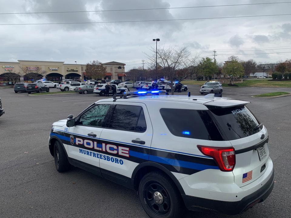 A Murfreesboro police officer shot a man suspected of "strong armed robbery" of an armored truck at a shopping center on North Thompson Lane on Wednesday, Nov. 22, 2023.
