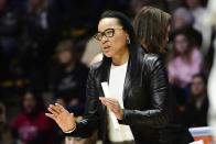 <p>Dawn Staley, a Hall of Fame WNBA player who now coaches at the University of South Carolina, is outspoken about racial justice. In June, she wrote a searing essay for the <strong>Player's Tribune</strong>, "Black People Are Tired," describing her visceral reaction to the killing of George Floyd and her <a href="https://www.theplayerstribune.com/en-us/articles/dawn-staley-racial-injustice" class="link rapid-noclick-resp" rel="nofollow noopener" target="_blank" data-ylk="slk:own experiences with racism">own experiences with racism</a>. "My heart is breaking," she wrote. "We've been down this road before, and we continue to go down this road. I mean, it's 2020, and we still have to see this."</p> <p>Staley, who also coaches the USA women's basketball team, has <a href="https://www.postandcourier.com/sports/carolina/sapakoff-dawn-staleys-rip-of-haley-usc-diversity-reflects-hard-road-ahead/article_aedcfab8-c767-11ea-b1a0-9719cbb043c5.html" class="link rapid-noclick-resp" rel="nofollow noopener" target="_blank" data-ylk="slk:advocated for diversity">advocated for diversity</a> in campus and athletic leadership at USC and even taken on politicians on Twitter while defending the Black Lives Matter movement.</p>